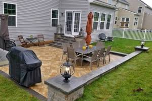 Patio with Sitting Wall and Outdoor Lighting